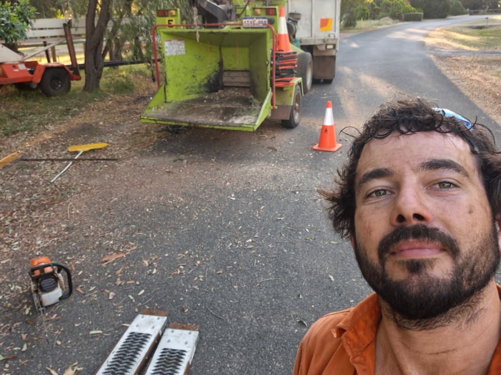 Chris on site with chipper — Hills District